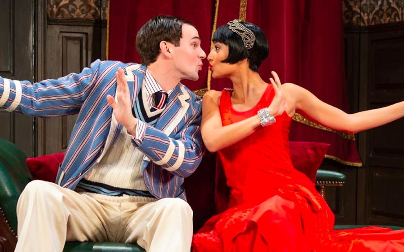 Actors performing a comedic scene in "The Play That Goes Wrong" on Broadway.