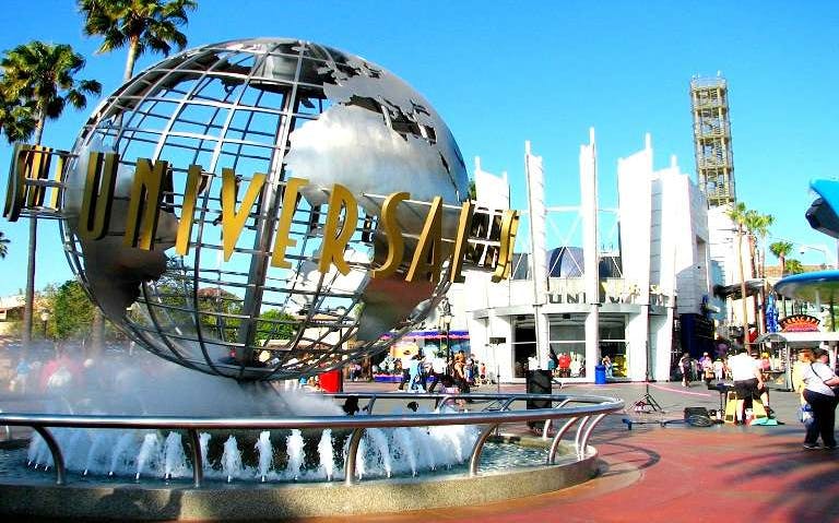 Universal Studios globe fountain with entrance in background, Los Angeles.