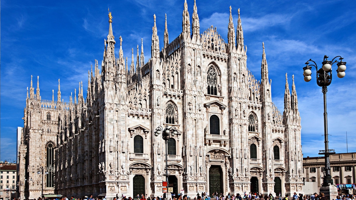 Milan Cathedral with tourists in the foreground, part of Last Supper & Milan's Downtown Guided Tour.