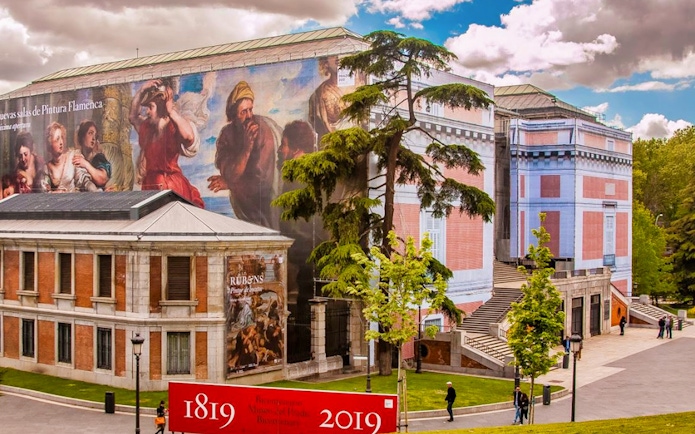 Prado Museum exterior with large mural, Madrid’s Prado Museum and El Retiro Park Guided Tour.
