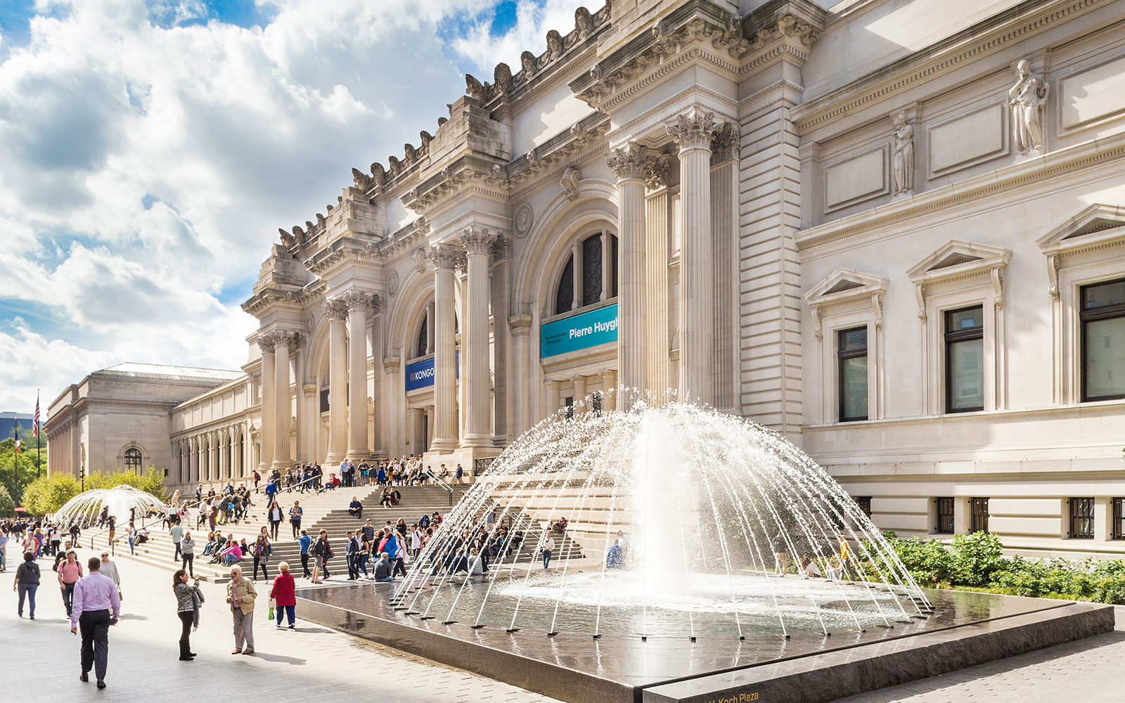 Metropolitan Museum of Art entrance with fountain, New York Explorer Pass attraction.