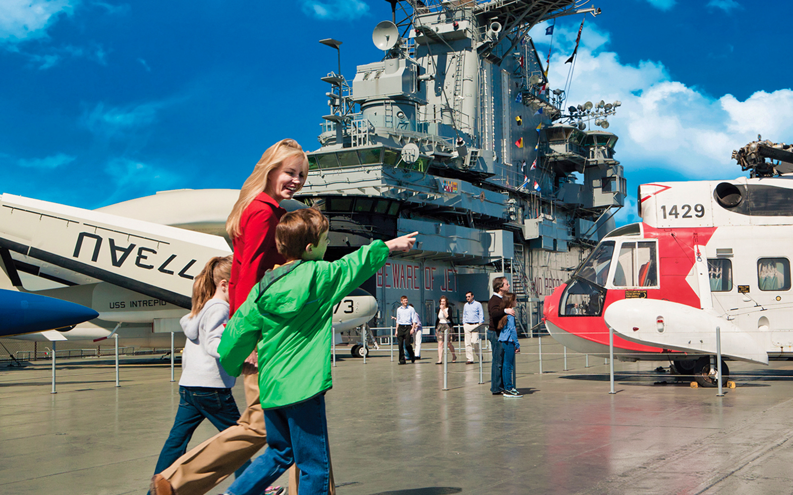 Visitors exploring the USS Intrepid Museum in New York City.