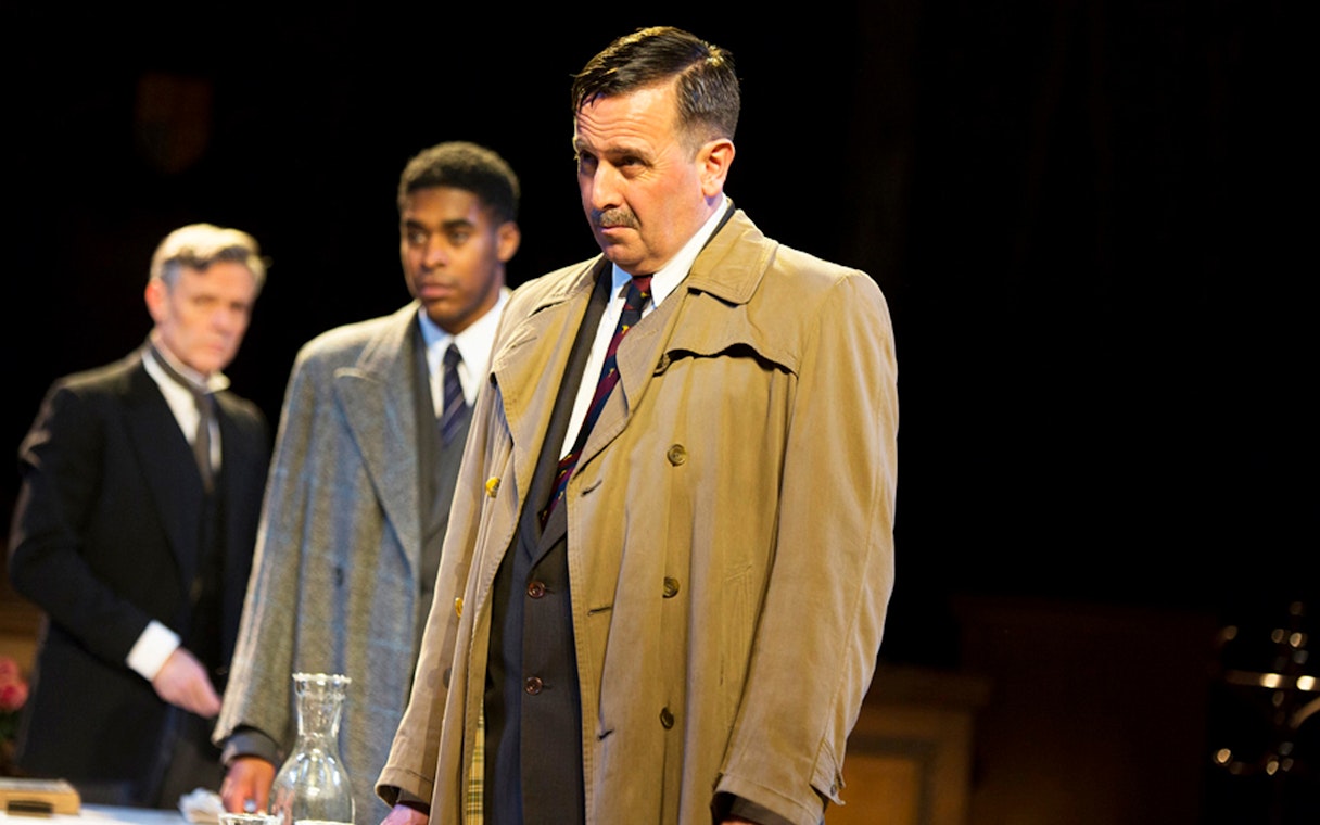 Actors in courtroom scene from "Witness for the Prosecution" play.