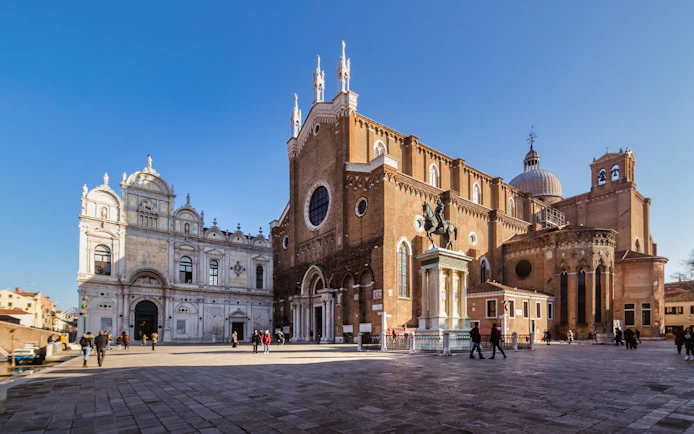 Venice walking tour with view of Basilica dei Santi Giovanni e Paolo and equestrian statue.