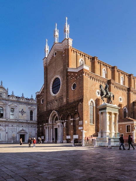 Venice walking tour with view of Basilica dei Santi Giovanni e Paolo and equestrian statue.