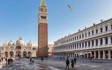 St. Mark's Square with Campanile and Basilica in Venice, Italy, during a guided walking tour.