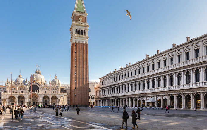 St. Mark's Square with Campanile and Basilica in Venice, Italy, during a guided walking tour.