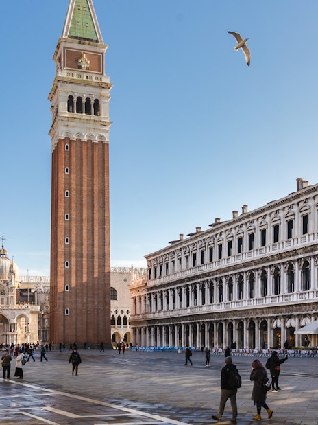 St. Mark's Square with Campanile and Basilica in Venice, Italy, during a guided walking tour.