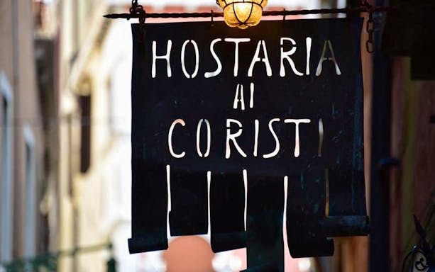 Sign of Hostaria ai Coristi restaurant in Venice, Italy
