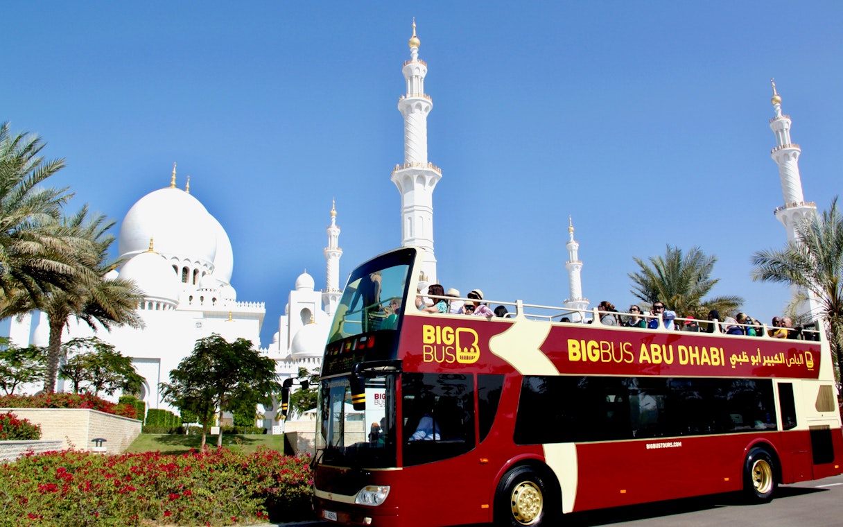 Hop-on hop-off bus near Sheikh Zayed Grand Mosque, Abu Dhabi.