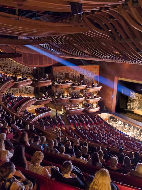 Audience watching a performance at Dubai Opera House.
