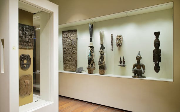 African art sculptures and carvings displayed at Quai Branly Museum, Paris.