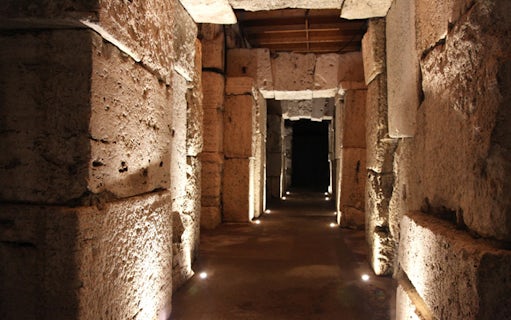 Colosseum underground passageway on small group tour, Rome.
