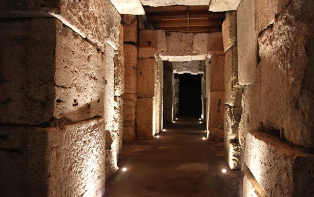 Colosseum underground passageway on small group tour, Rome.