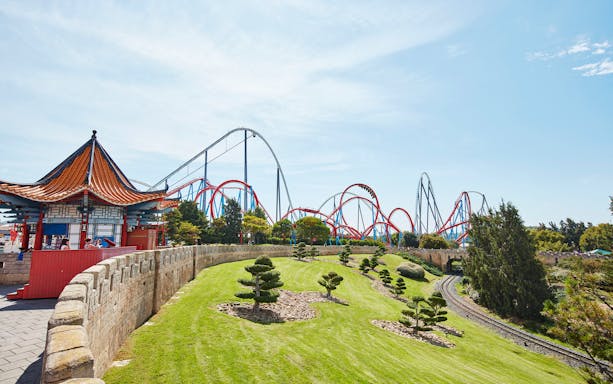 Roller coasters and themed architecture at PortAventura Park, Spain.