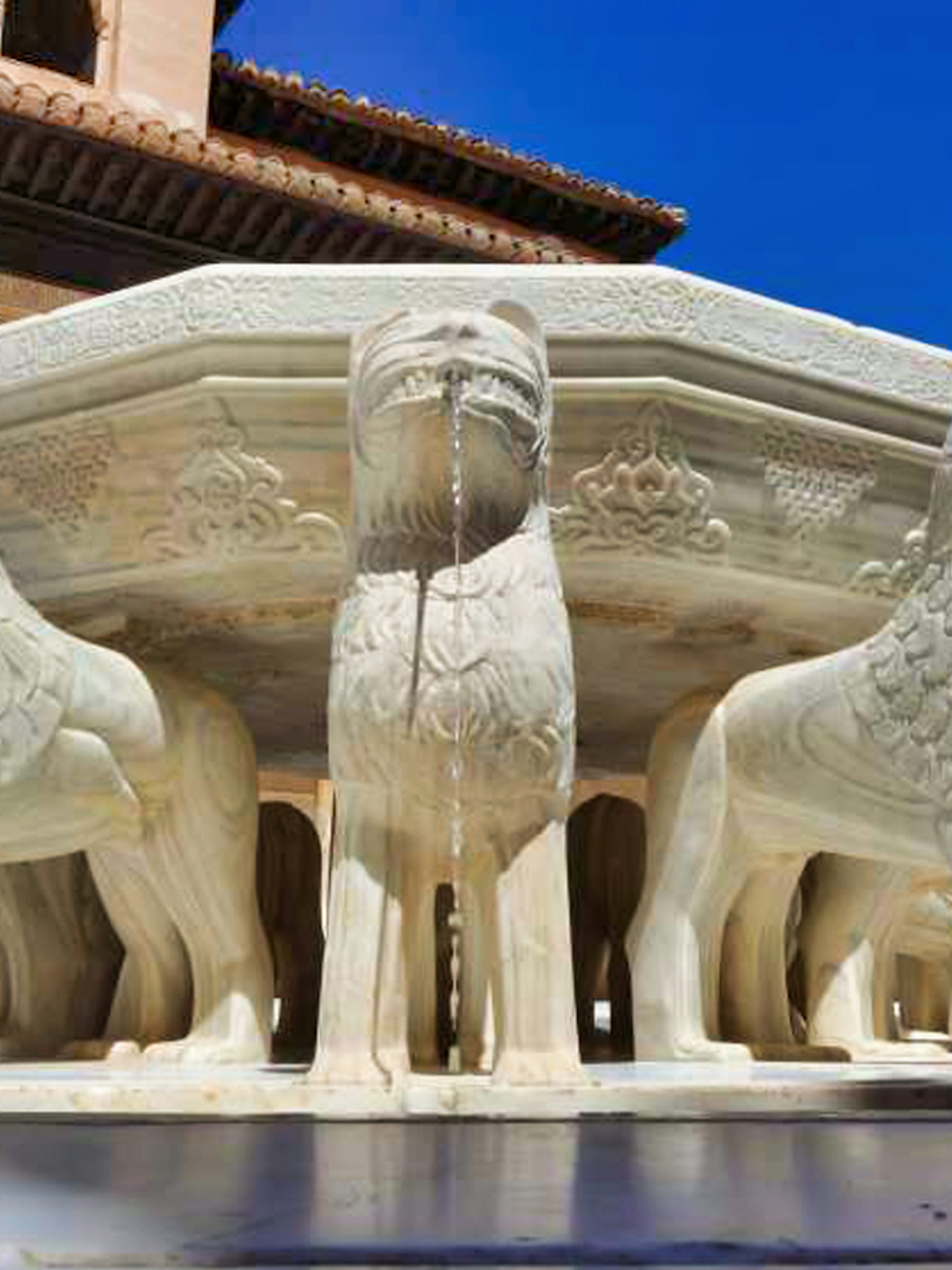 Lion Fountain at Alhambra's Nasrid Palaces, Granada, Spain.