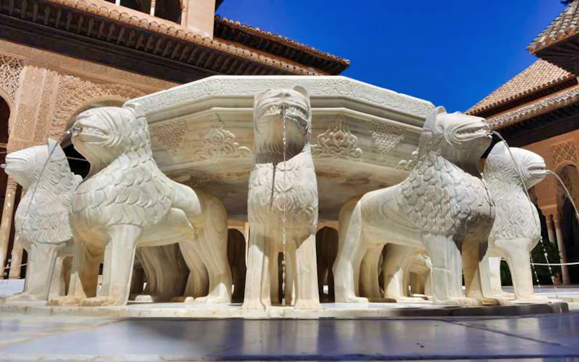 Lion Fountain at Alhambra's Nasrid Palaces, Granada, Spain.
