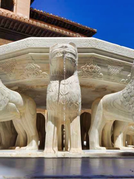 Lion Fountain at Alhambra's Nasrid Palaces, Granada, Spain.