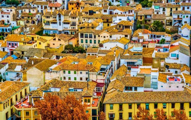 Aerial view of Albaicin's historic rooftops in Granada, Spain.