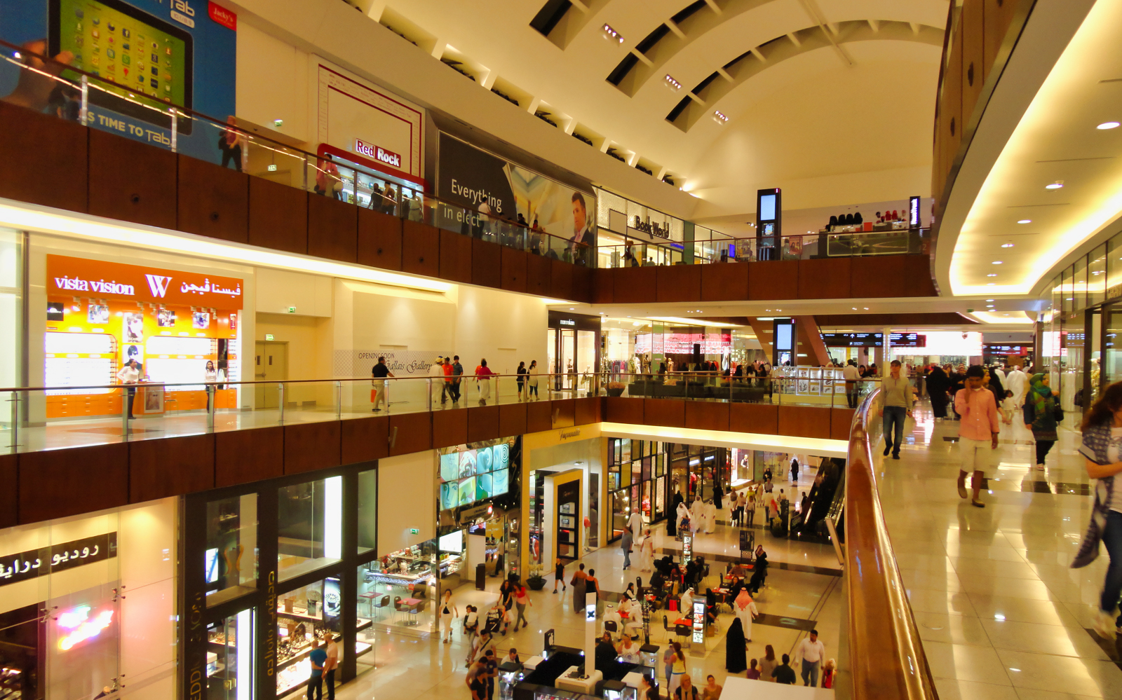 Dubai Mall interior with visitors near cinema ticket counters.
