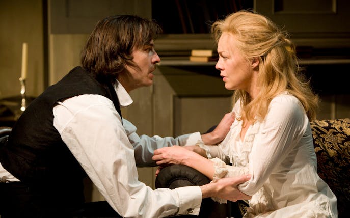 Two actors in an intense scene from the play Rosmersholm.