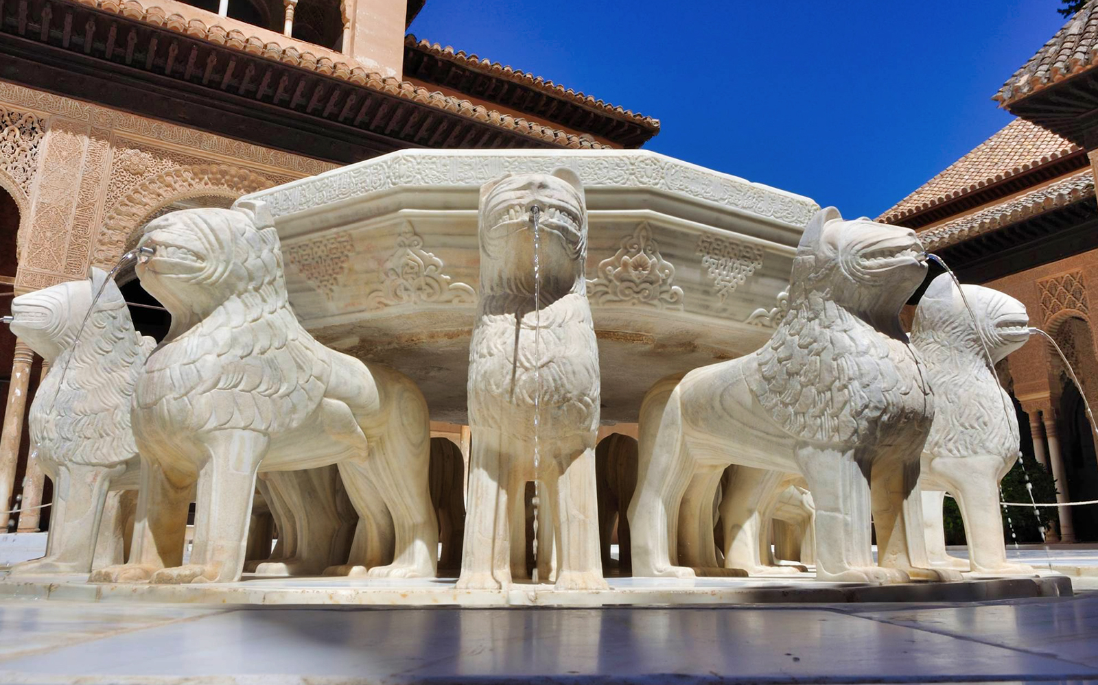 Lion Fountain at Alhambra's Nasrid Palaces, Granada, Spain.