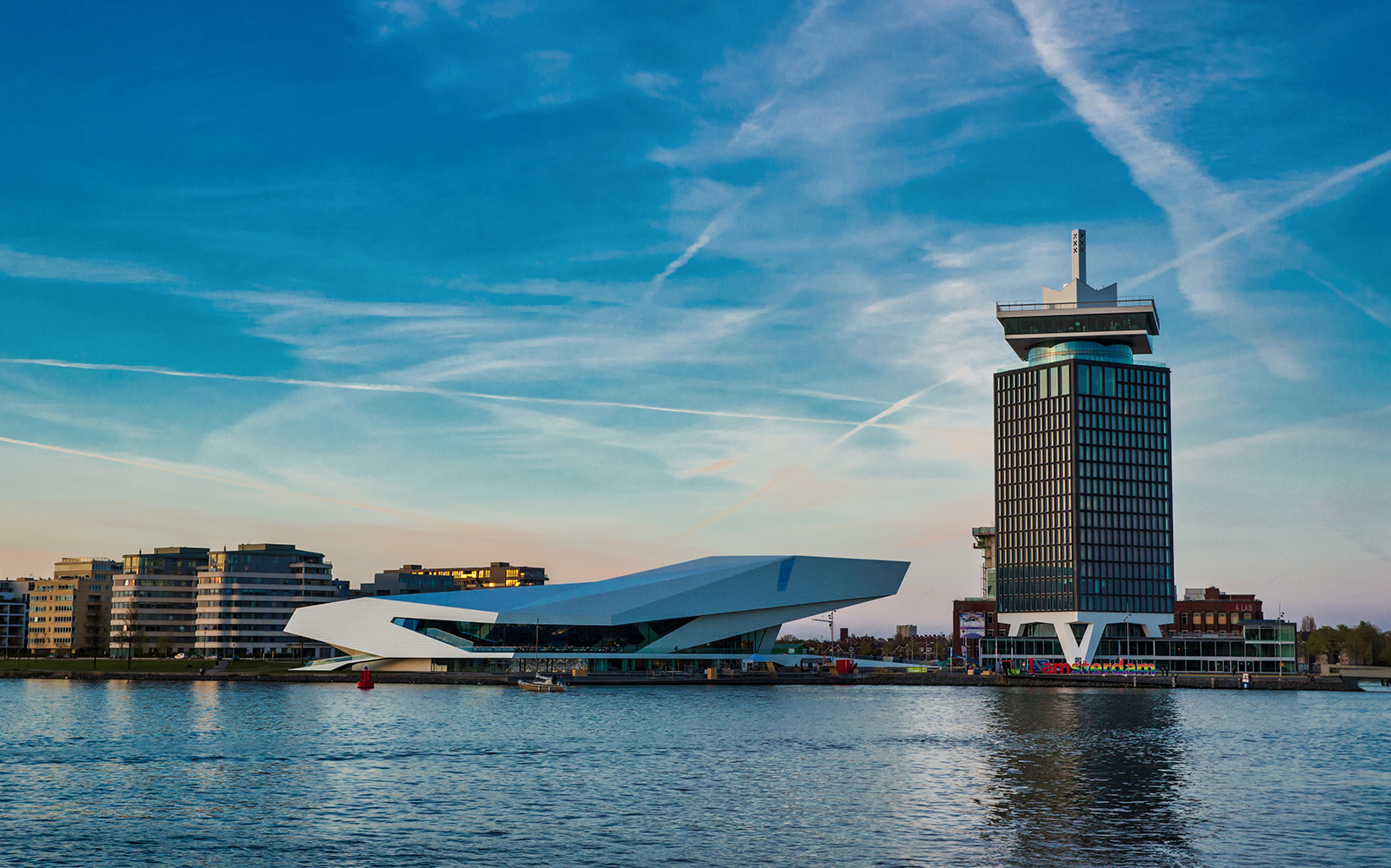 A'DAM Lookout tower and Eye Filmmuseum by the water in Amsterdam.