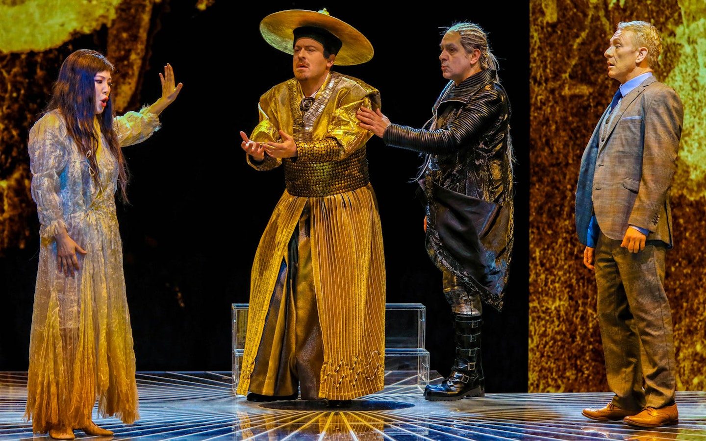 Performers in traditional costumes on stage during Madama Butterfly opera.