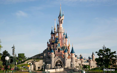 Disneyland Paris Sleeping Beauty Castle with blue sky.