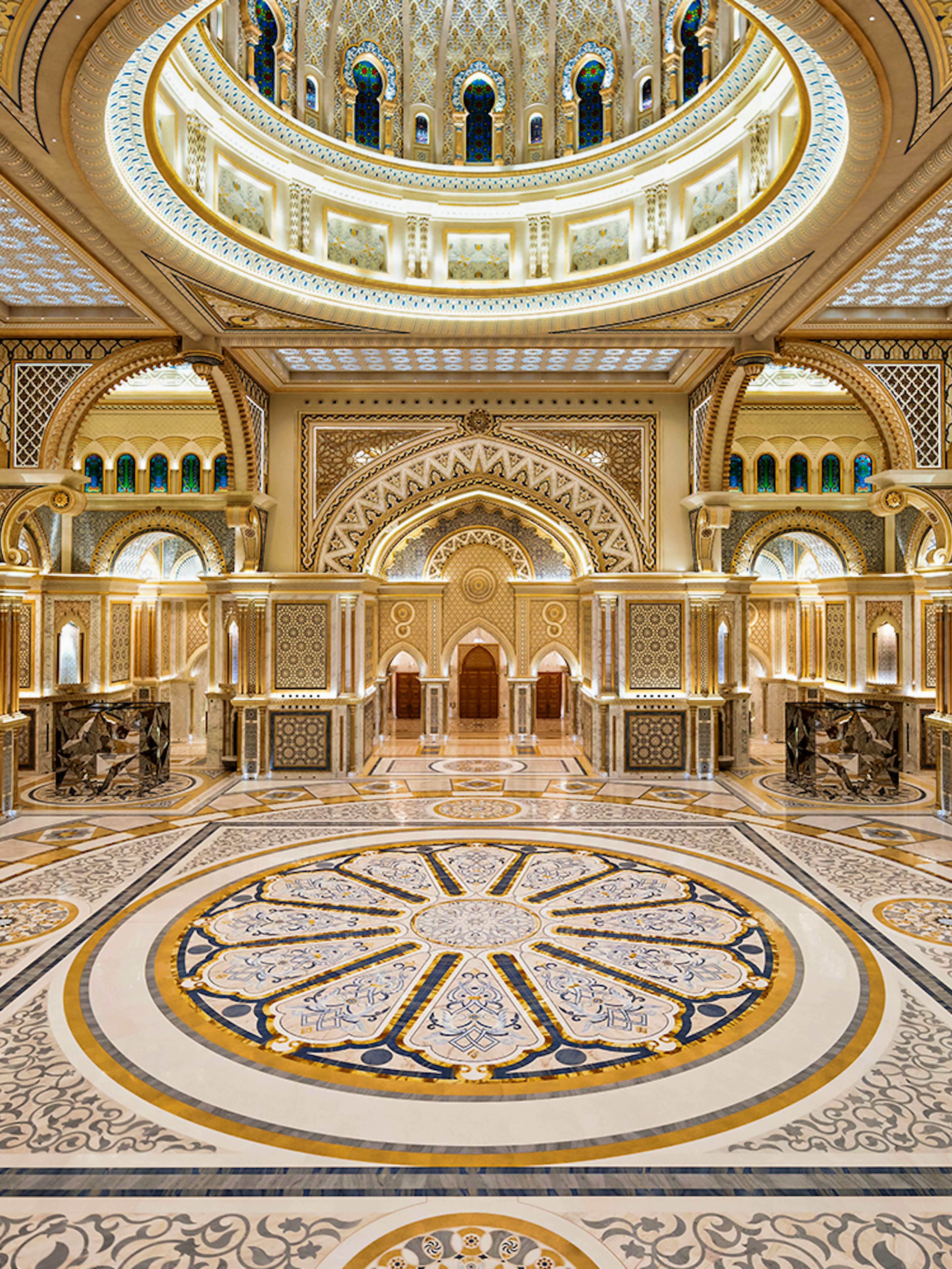 Ornate interior of Qasr Al Watan in Abu Dhabi, showcasing intricate patterns and grand architecture.