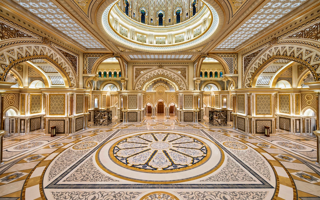 Ornate interior of Qasr Al Watan in Abu Dhabi, showcasing intricate patterns and grand architecture.
