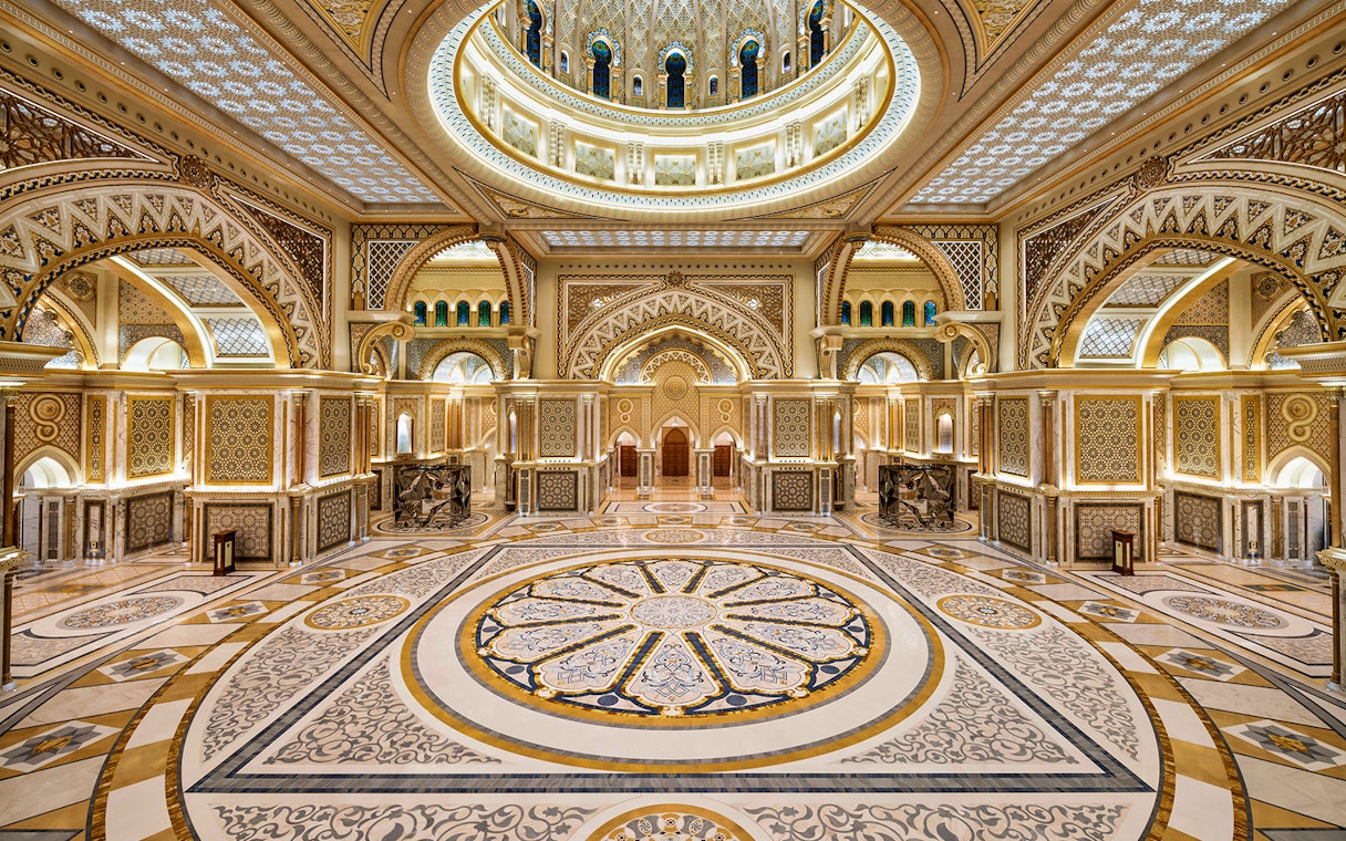 Ornate interior of Qasr Al Watan in Abu Dhabi, showcasing intricate patterns and grand architecture.