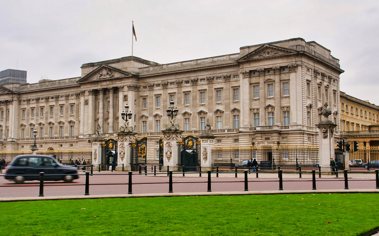 London Changing of the Guard ceremony at Buckingham Palace with Westminster Dome in view.