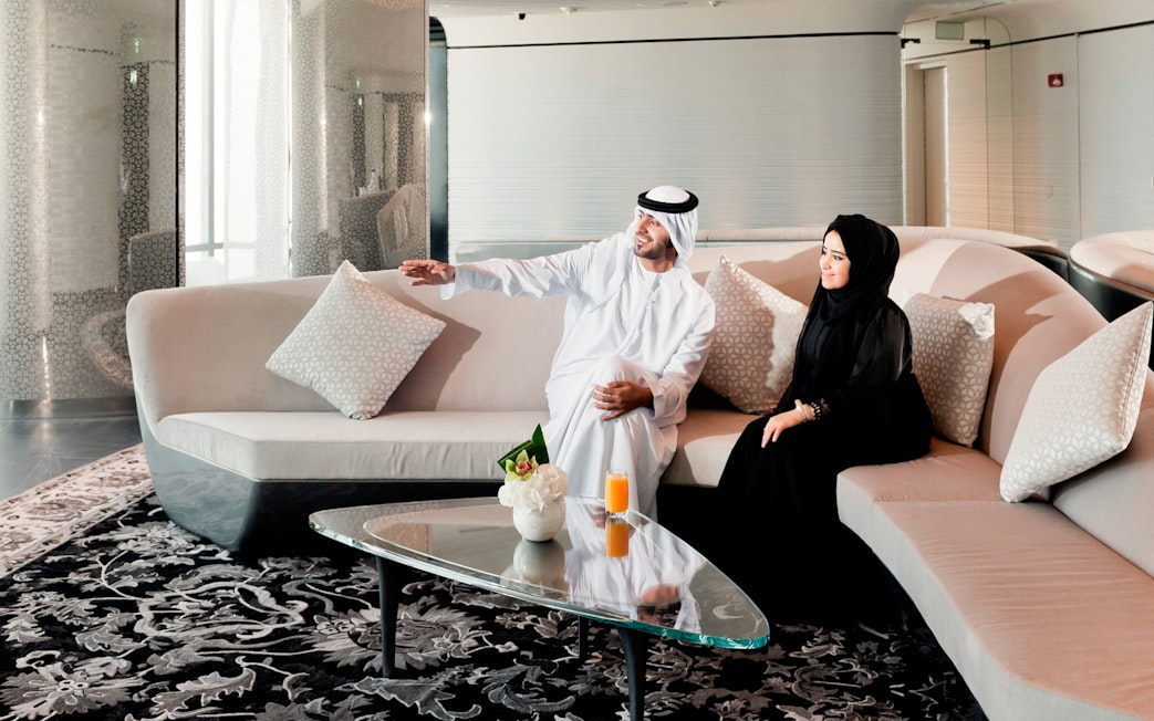 Guests relaxing in the Burj Khalifa At the Top Sky Lounge, Dubai.