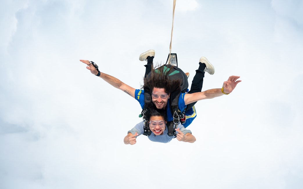 Tandem skydive over Great Ocean Road with instructor and participant freefalling.