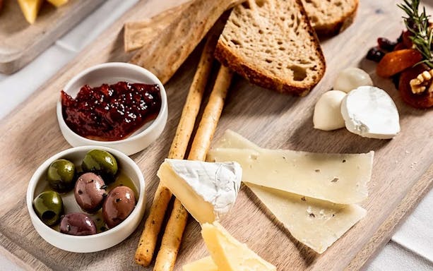 Cheese and olives platter on Captain Cook Cocktail Harbour Bar Cruise.