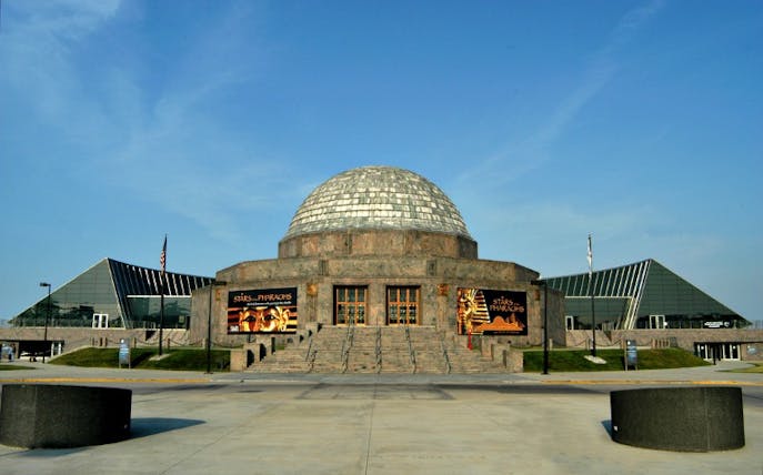 Adler Planetarium entrance with dome and exhibits in Chicago.
