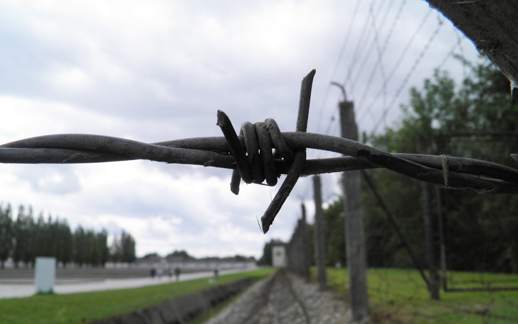 Barbed wire fence at Dachau Concentration Camp Memorial Site, Germany.