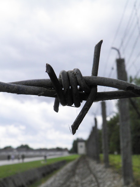 Barbed wire fence at Dachau Concentration Camp Memorial Site, Germany.