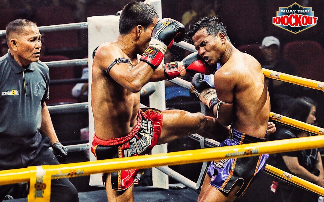 Muay Thai fighters in action during a live match, Bangkok.