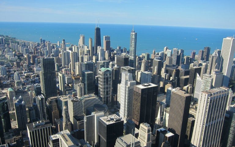 Chicago skyline view from Sky Deck with Lake Michigan in the background.