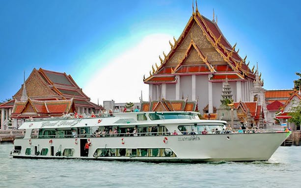 Grand Pearl river cruise passing Wat Arun temple in Ayutthaya, Thailand.