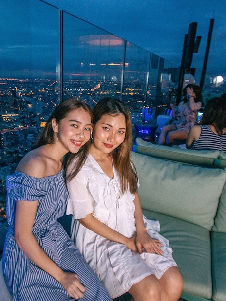 Guests enjoying the view at Mahanakhon SkyWalk, Bangkok.