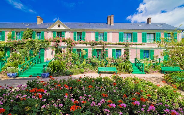 Giverny Monet’s house with vibrant gardens, part of a full day tour from Paris.