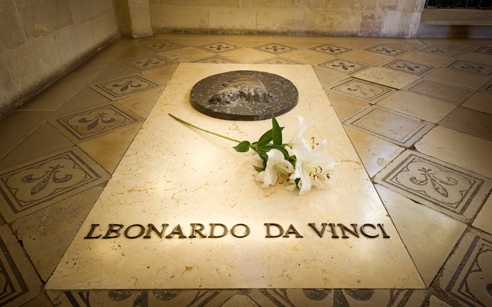 Leonardo da Vinci's tombstone with white lilies at Amboise Castle, France.