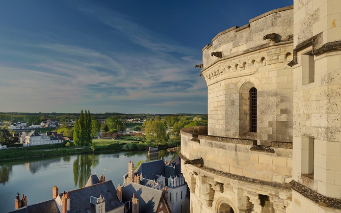 Château overlooking the Loire River in Chaumont sur Loire, with village and landscape views.