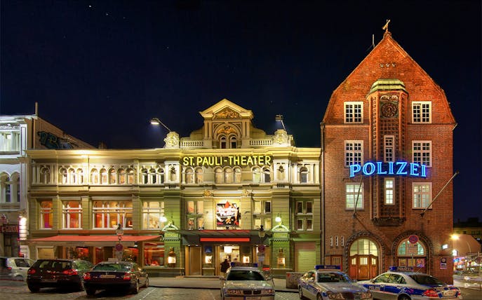 St. Pauli Theater and police station at night, Reeperbahn, Hamburg.