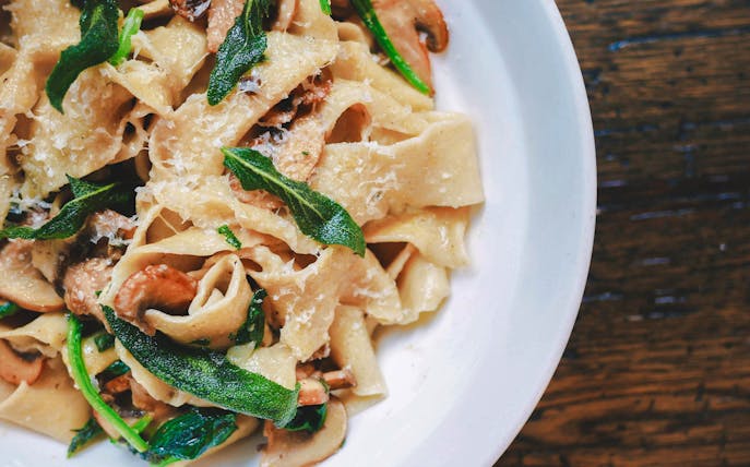Pasta dish with mushrooms and greens served at TV Tower restaurant.