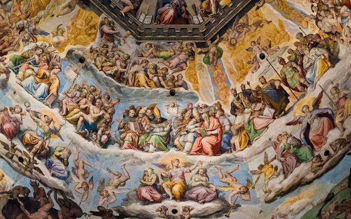 Fresco inside Florence's Duomo depicting religious figures, part of Uffizi and Duomo tour.