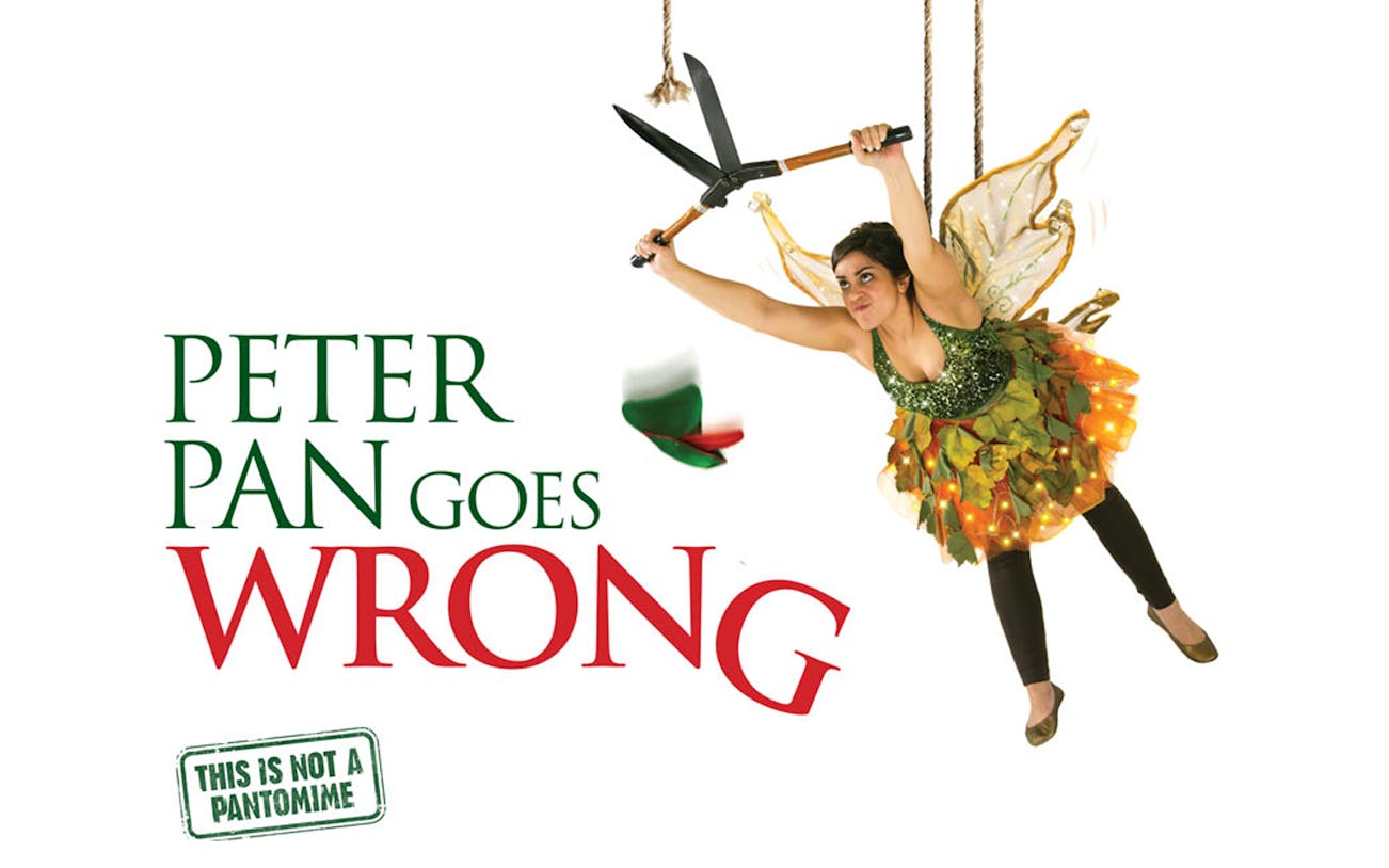 Performer in fairy costume suspended with shears, promoting "Peter Pan Goes Wrong" show.